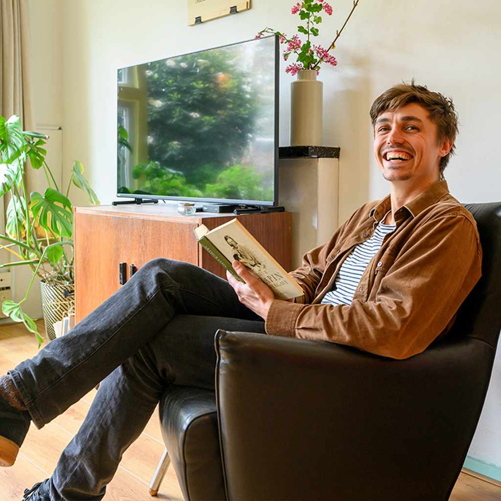 Tennant in living room of VPS property