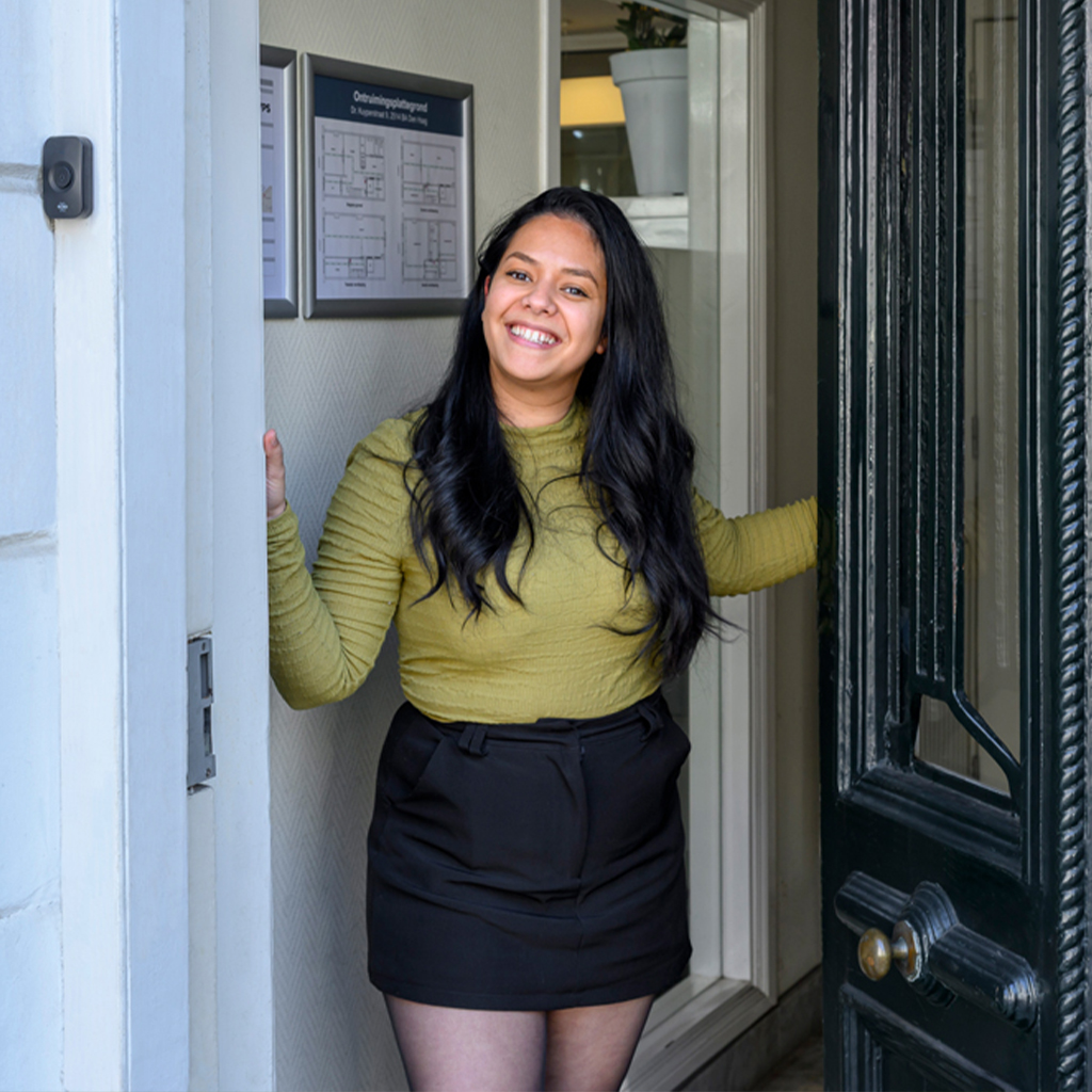 Tennant at front door of VPS rental property